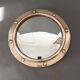Witch porthole mirror 1940 in vintage gilded brass.