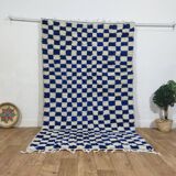 Moroccan Berber rug with a blue and ecru checkerboard pattern – 250 x 147 cm
