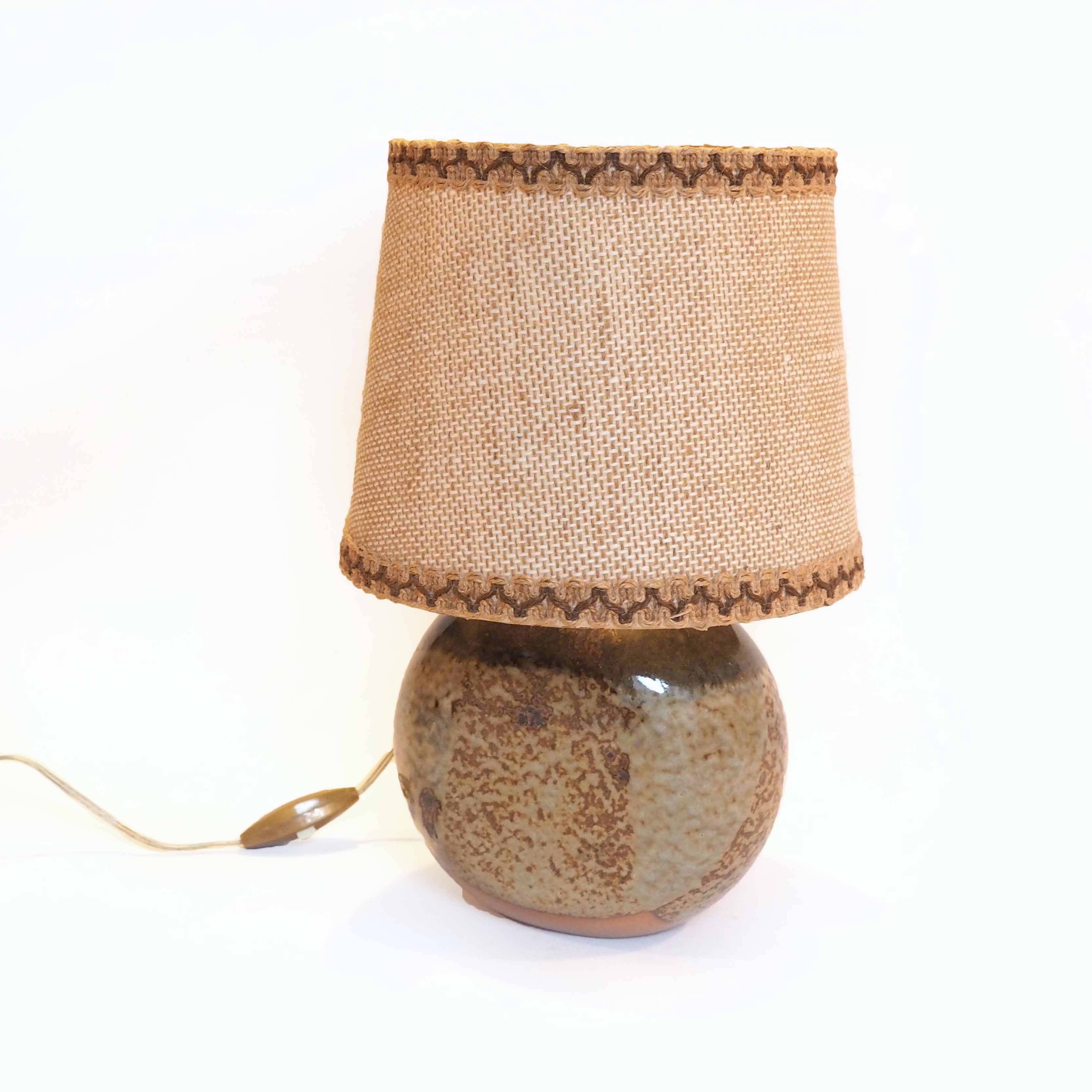 Flattened ball ceramic lamp