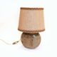 Flattened ball ceramic lamp
