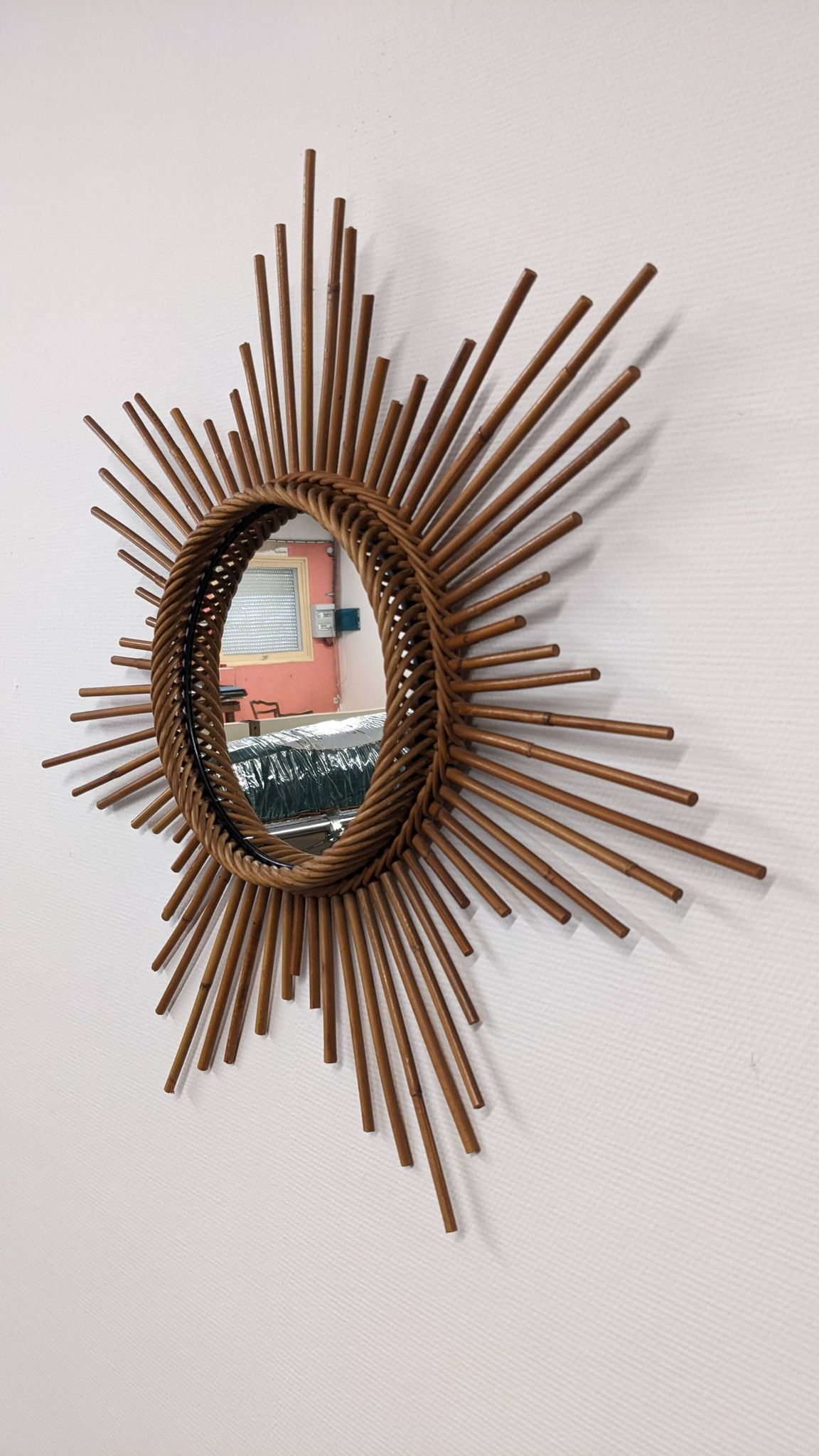 XL starry sun mirror in rattan, France around 1970