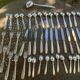 Cutlery set consisting of 49 pieces in silver metal, antique and collector's item