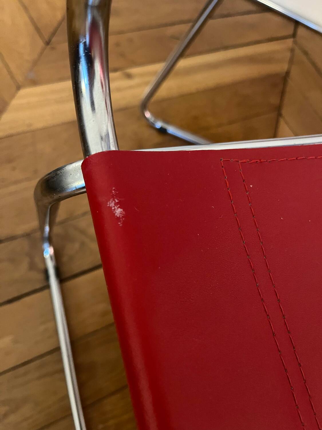 Set of 4 chairs in red leather and chrome tubular metal