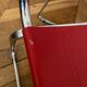 Set of 4 chairs in red leather and chrome tubular metal