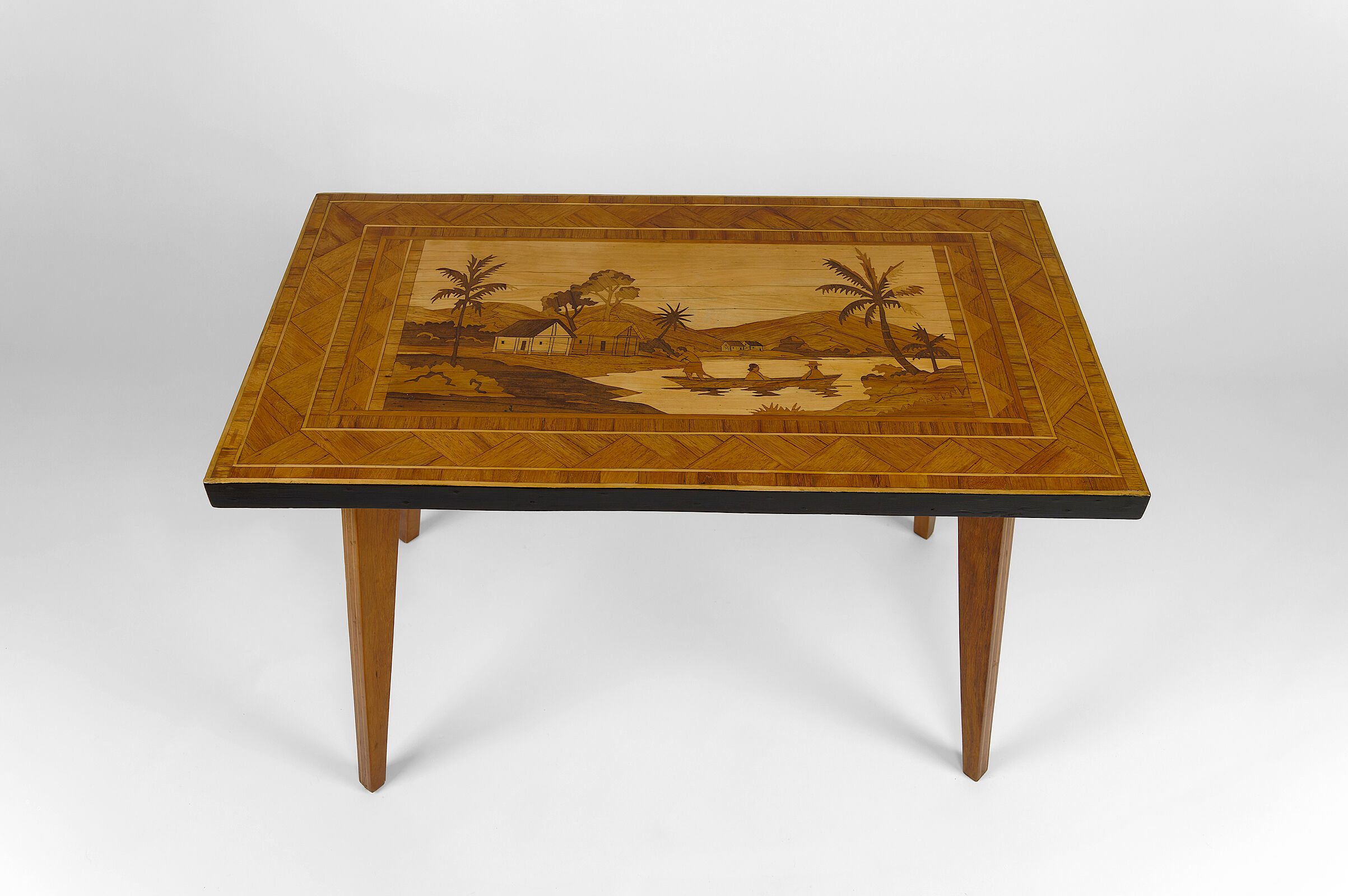 African Midcentury coffee table in inlaid wood, circa 1960