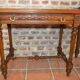 Walnut table with marble top and one drawer