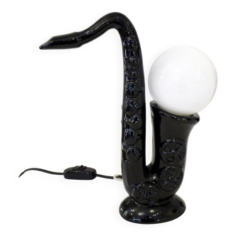 1980' Saxophone lamp in black earthenware & opaline globe