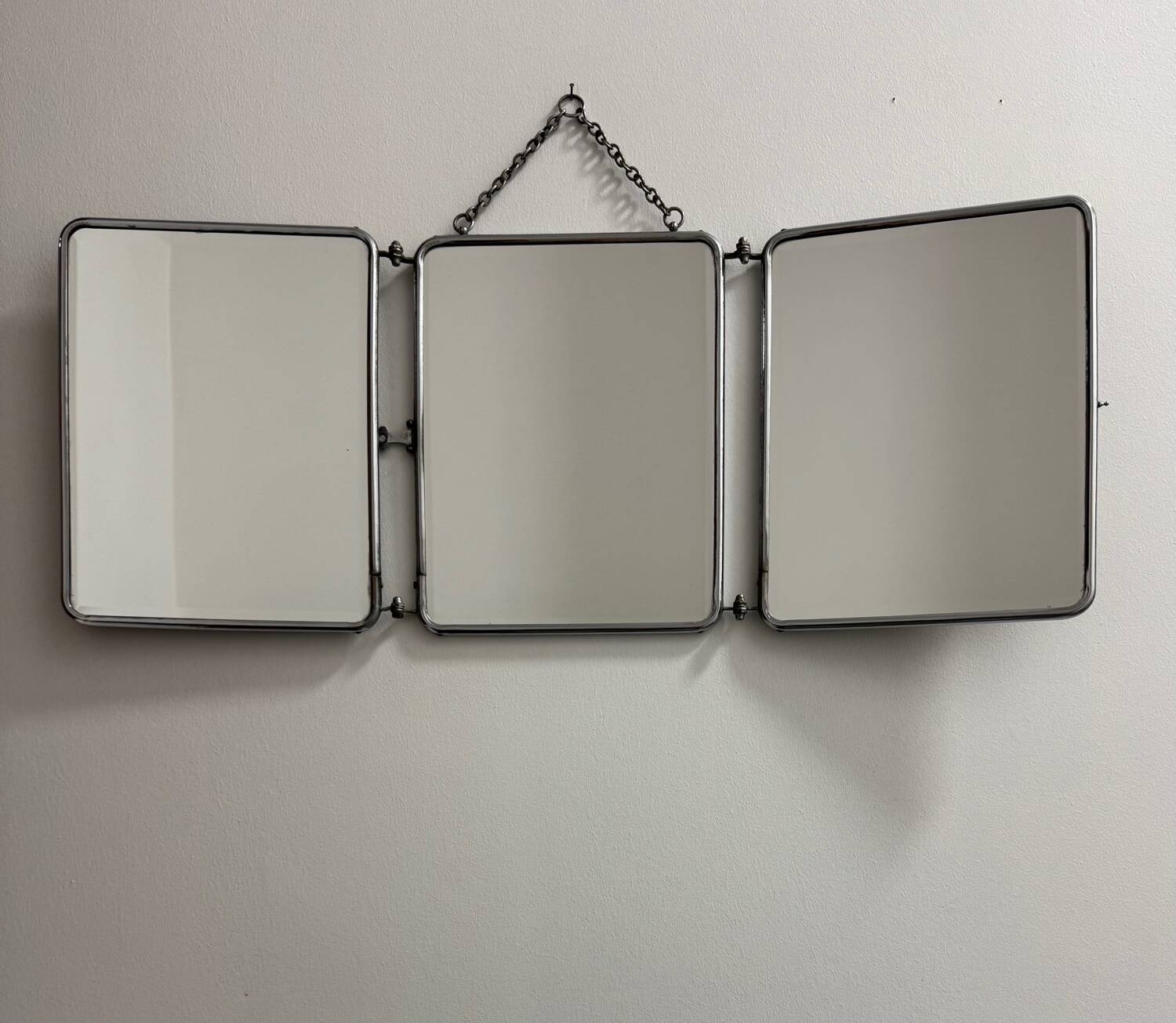 Bevelled triptych barber mirror from the 1950s.