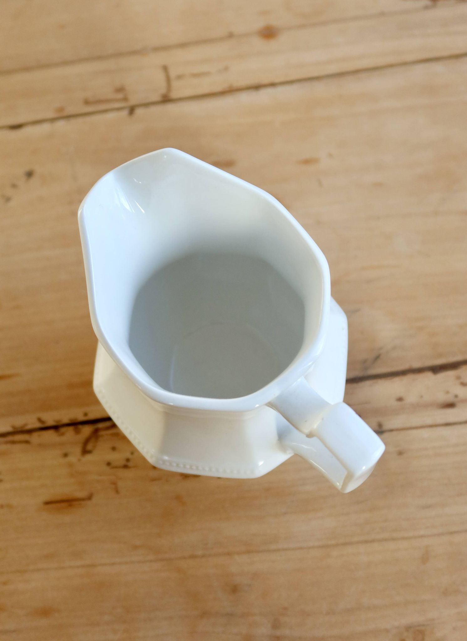 English porcelain milk jug by Johnson Brothers, model Pearl, with design.