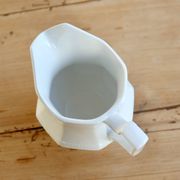 English porcelain milk jug by Johnson Brothers, model Pearl, with design.