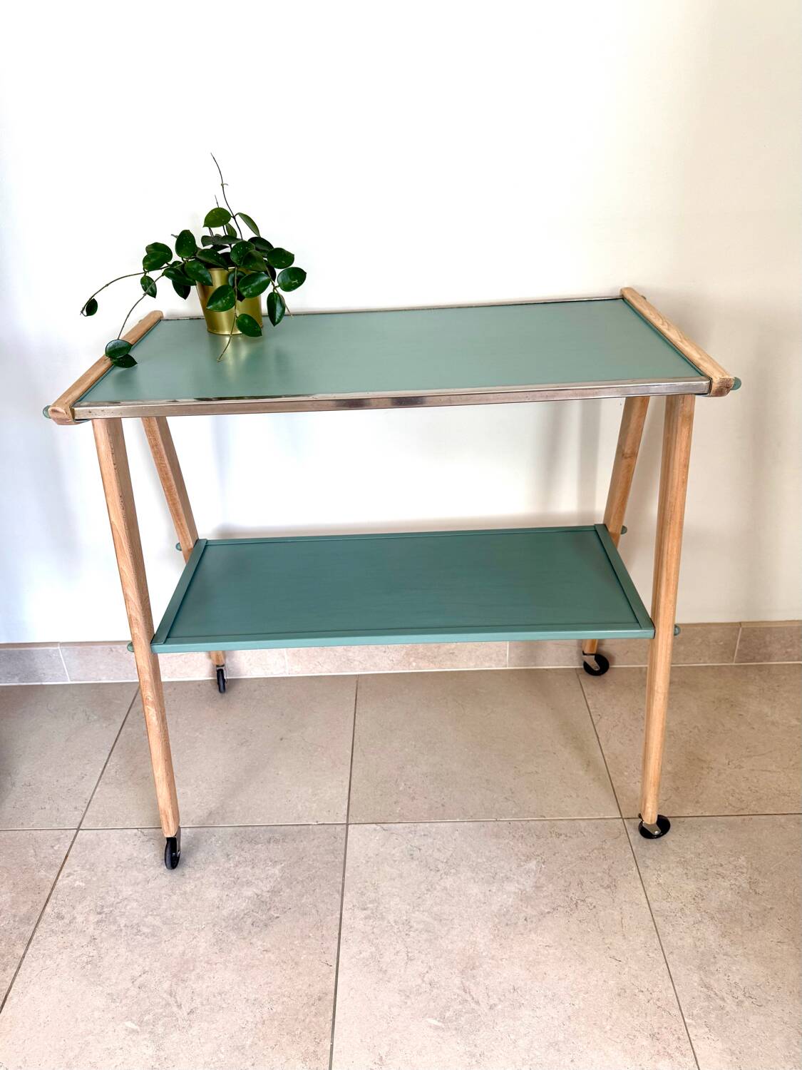 Serving trolley with compass legs, vintage table on wheels.