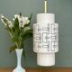 Vintage suspension globe in white opaline with black drawings.