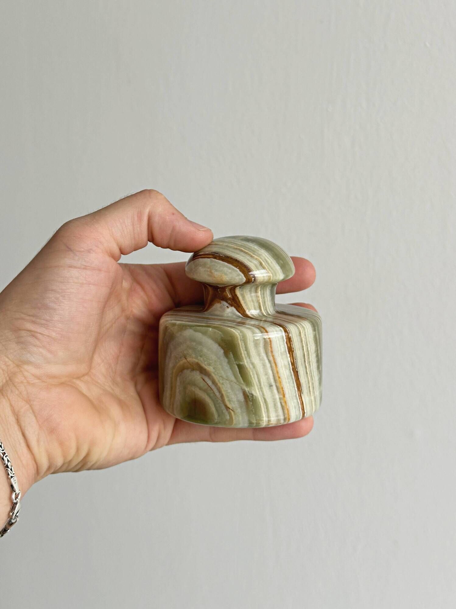 Green veined stone paperweight