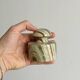 Green veined stone paperweight