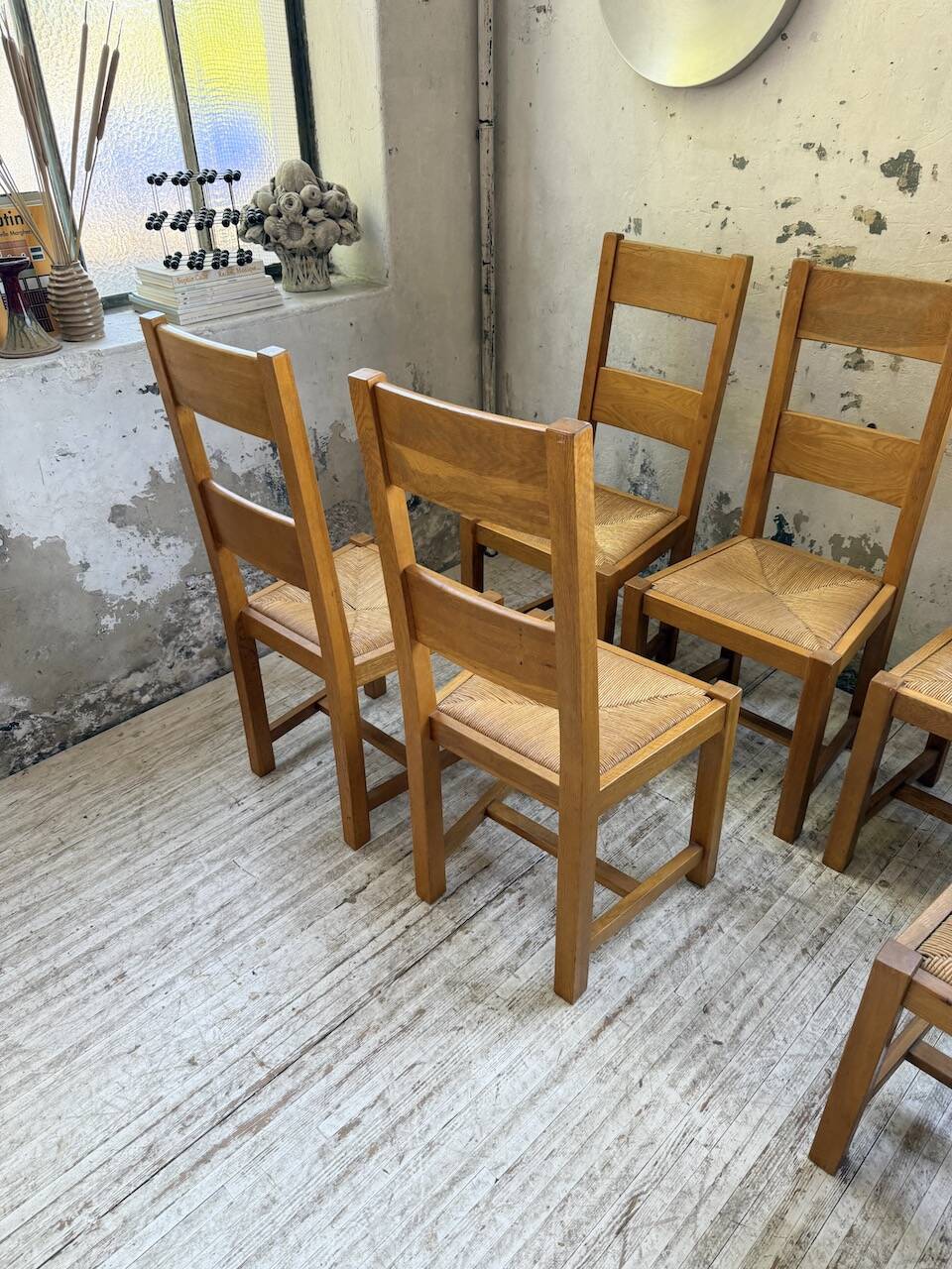Set of 8 blond oak chairs with straw seats