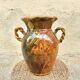 Ancient large vase in glazed speckled terracotta