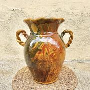 Ancient large vase in glazed speckled terracotta