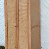 Renovated antique wardrobe in raw wood and caning.