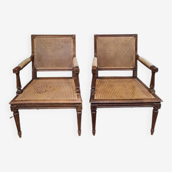 Paire de fauteuils canné de style Louis XVI