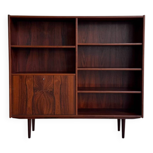 Bibliothèque vintage en palissandre avec porte à rabat.