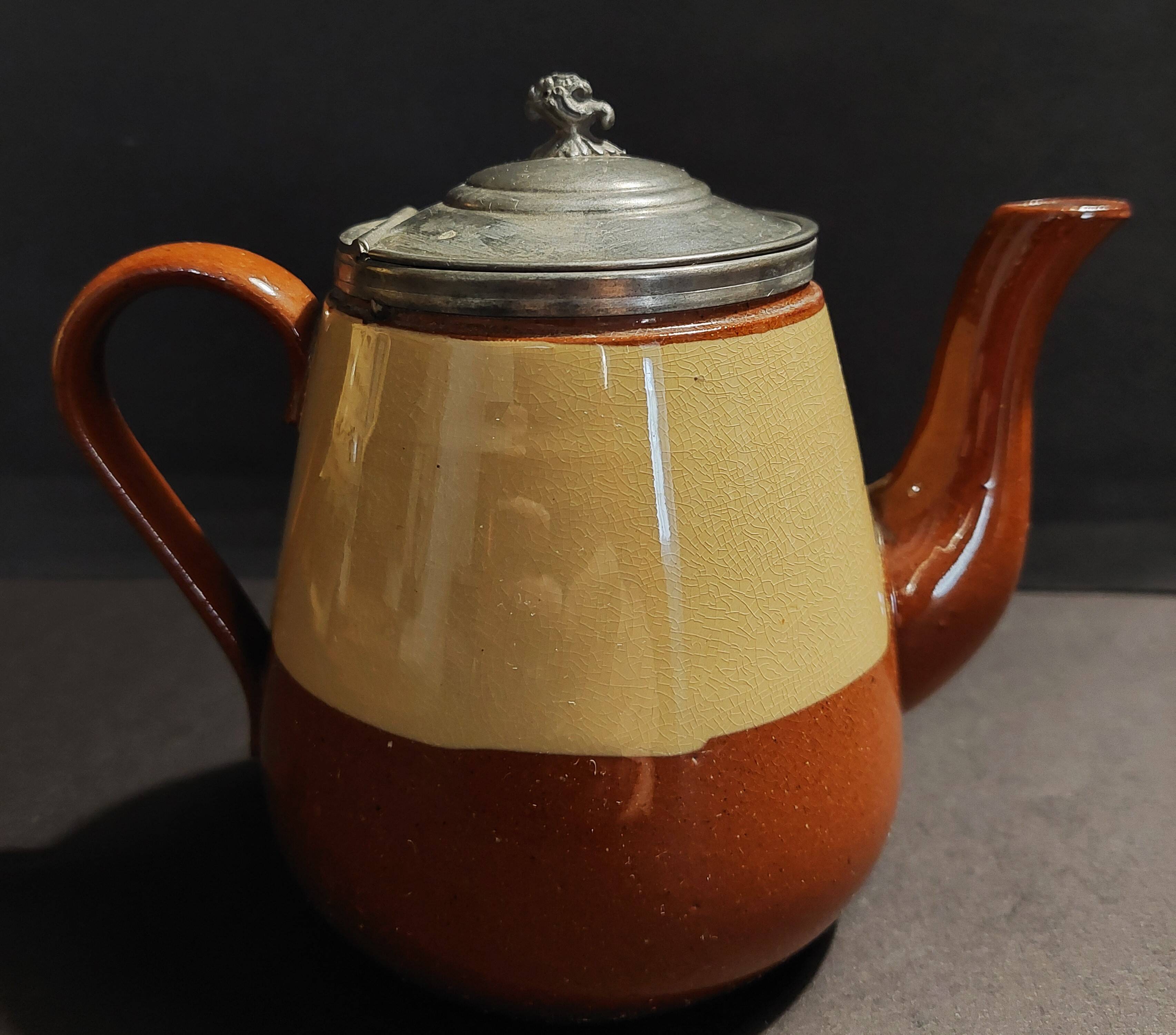 Beige and brown earthenware teapot with pewter lid, early 20th century