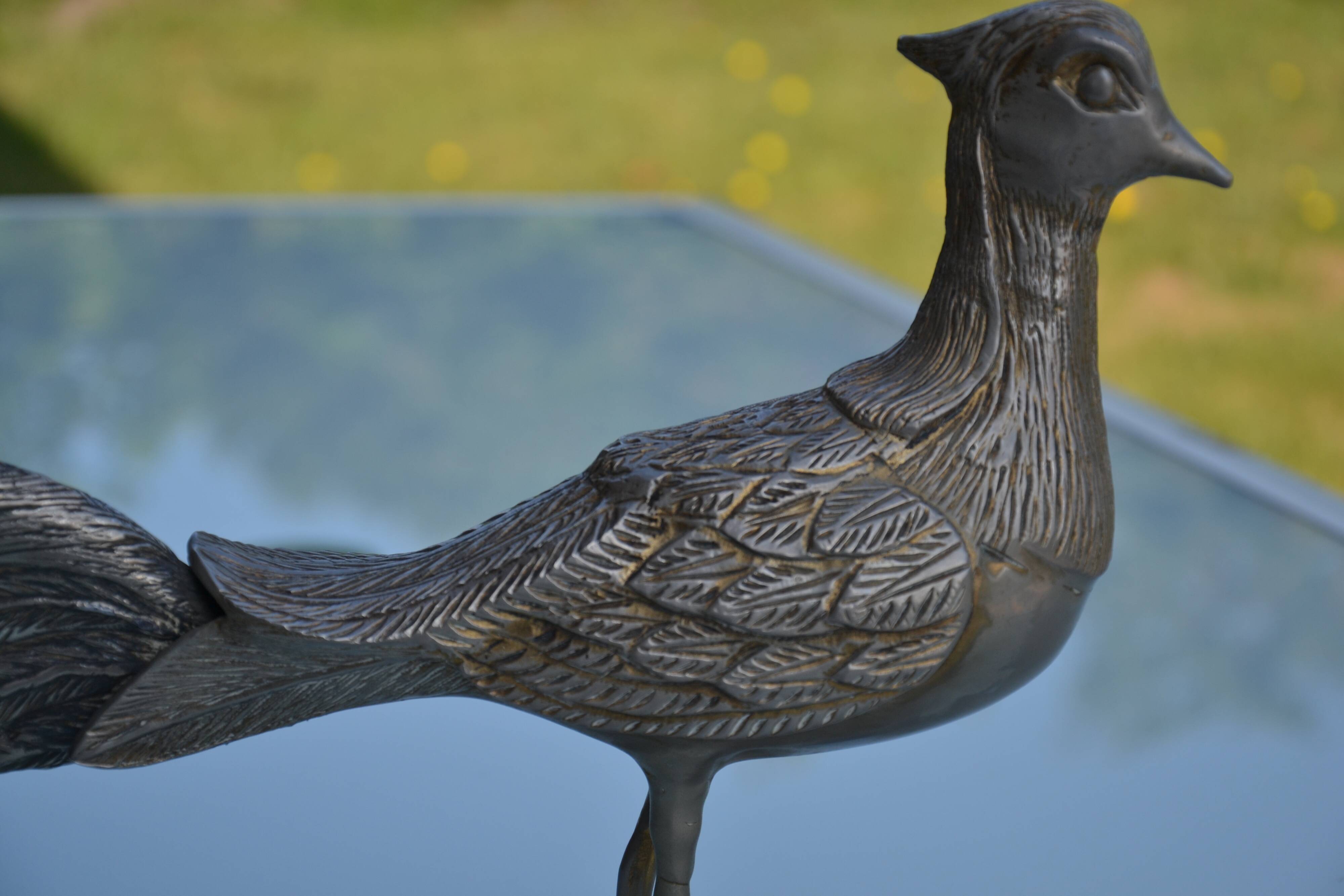 Brass peacock sculpture