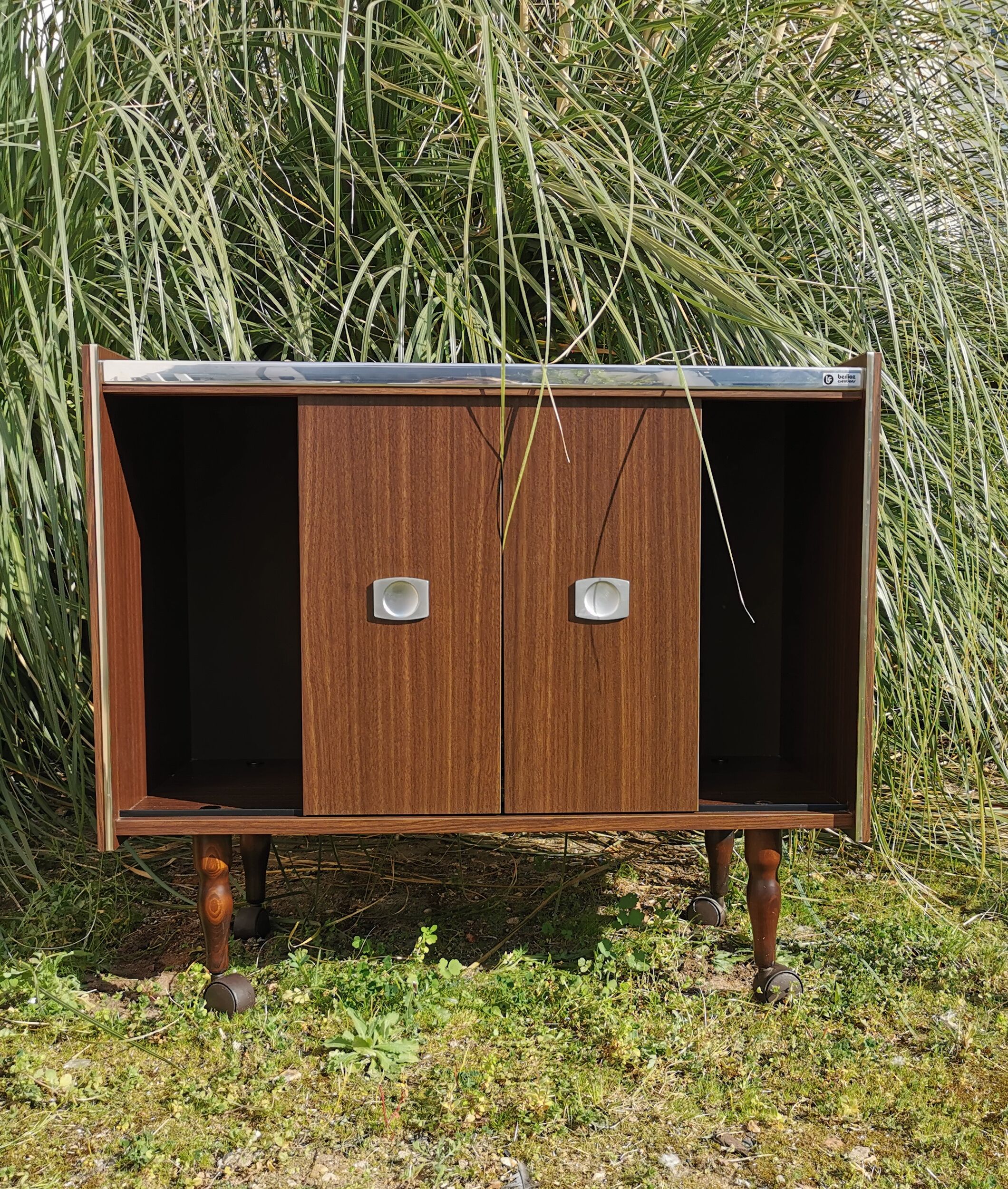 Furniture bar showcase with vintage wheels