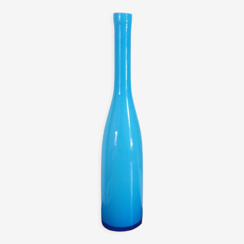 Bottle shaped vase in blue minimalist style in vintage glass