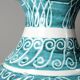 Vintage turquoise ceramic baluster vase with incised decoration.