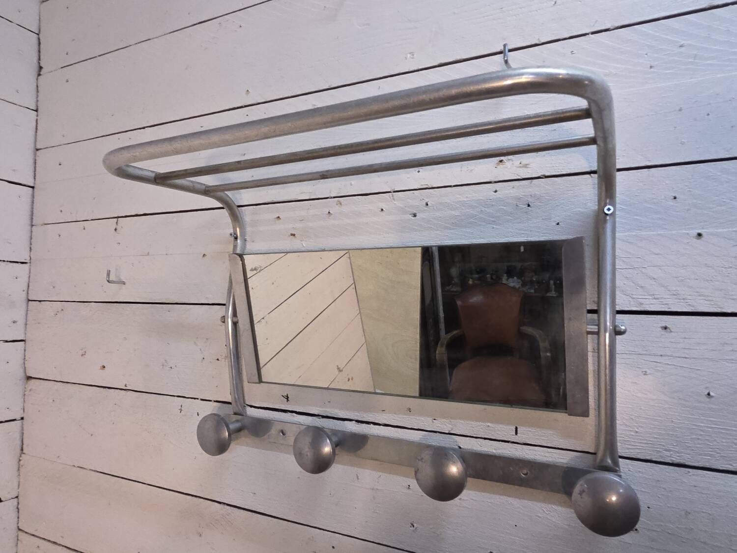 1960s swivel mirrored aluminum coat rack