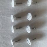 white ceramic door knobs with illustration