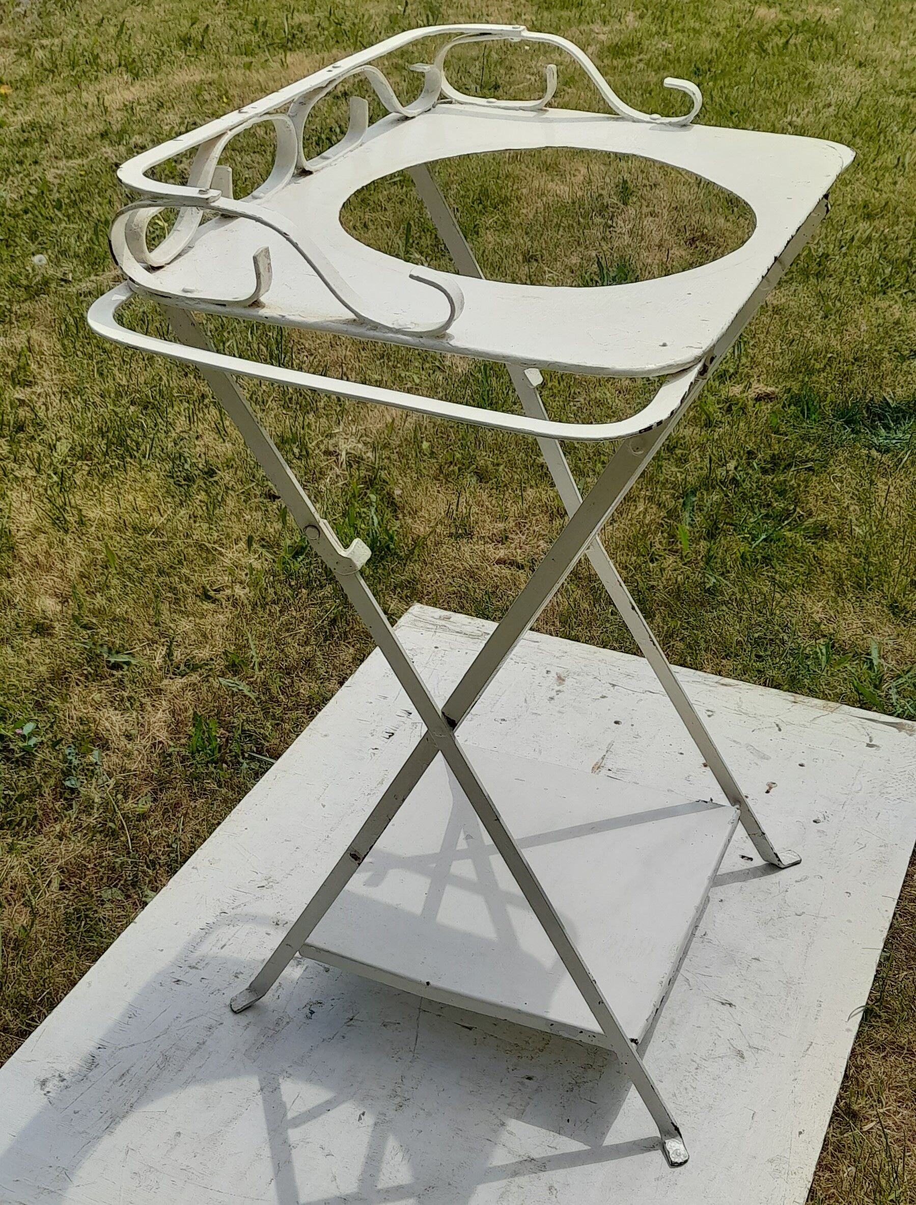 Folding metal vanity cabinet
