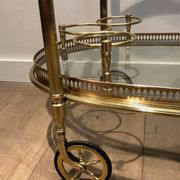 Oval brass trolley from Maison Baguès.
