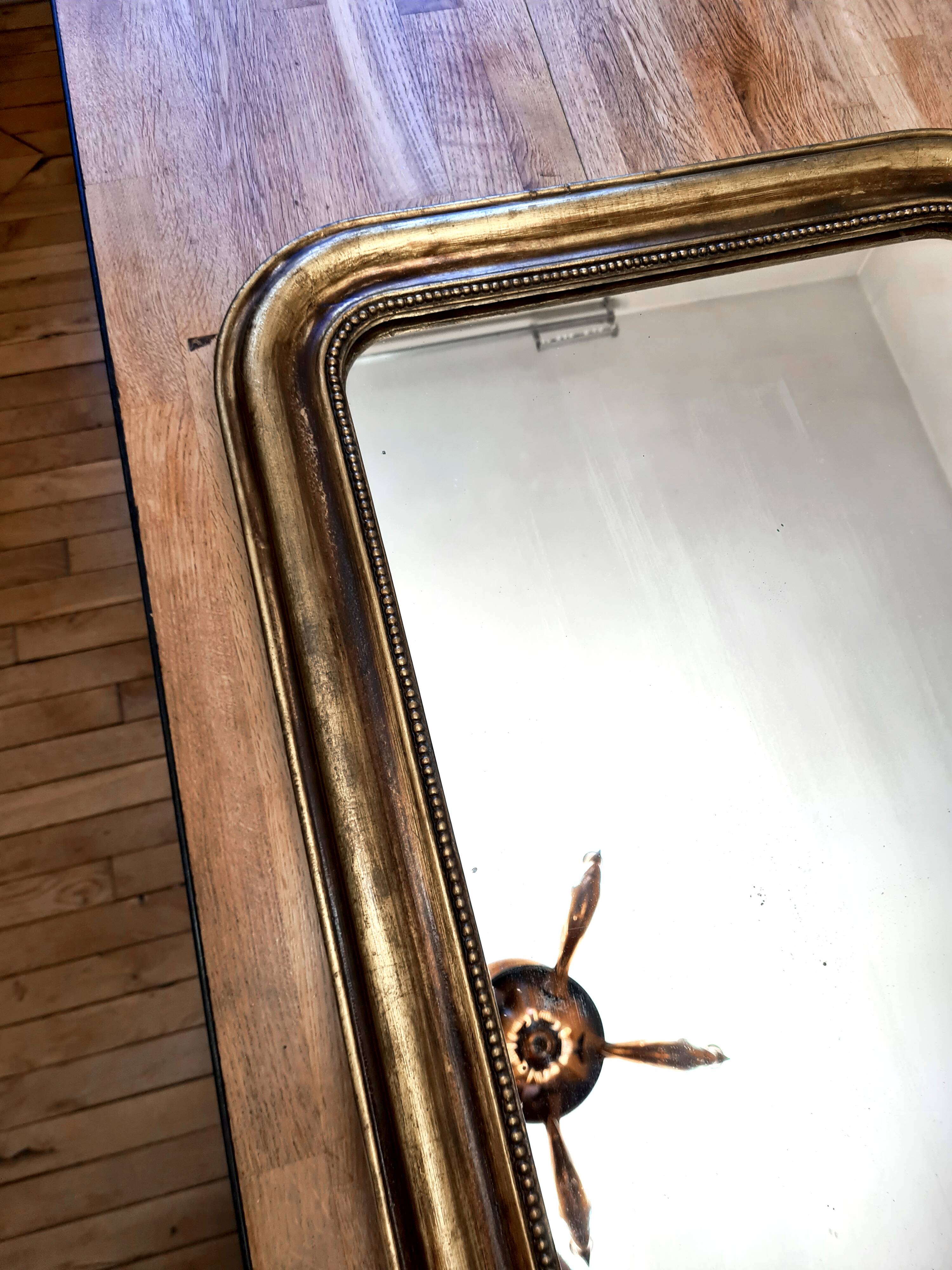 Antique Louis-Philippe gilded mirror “Apoline”