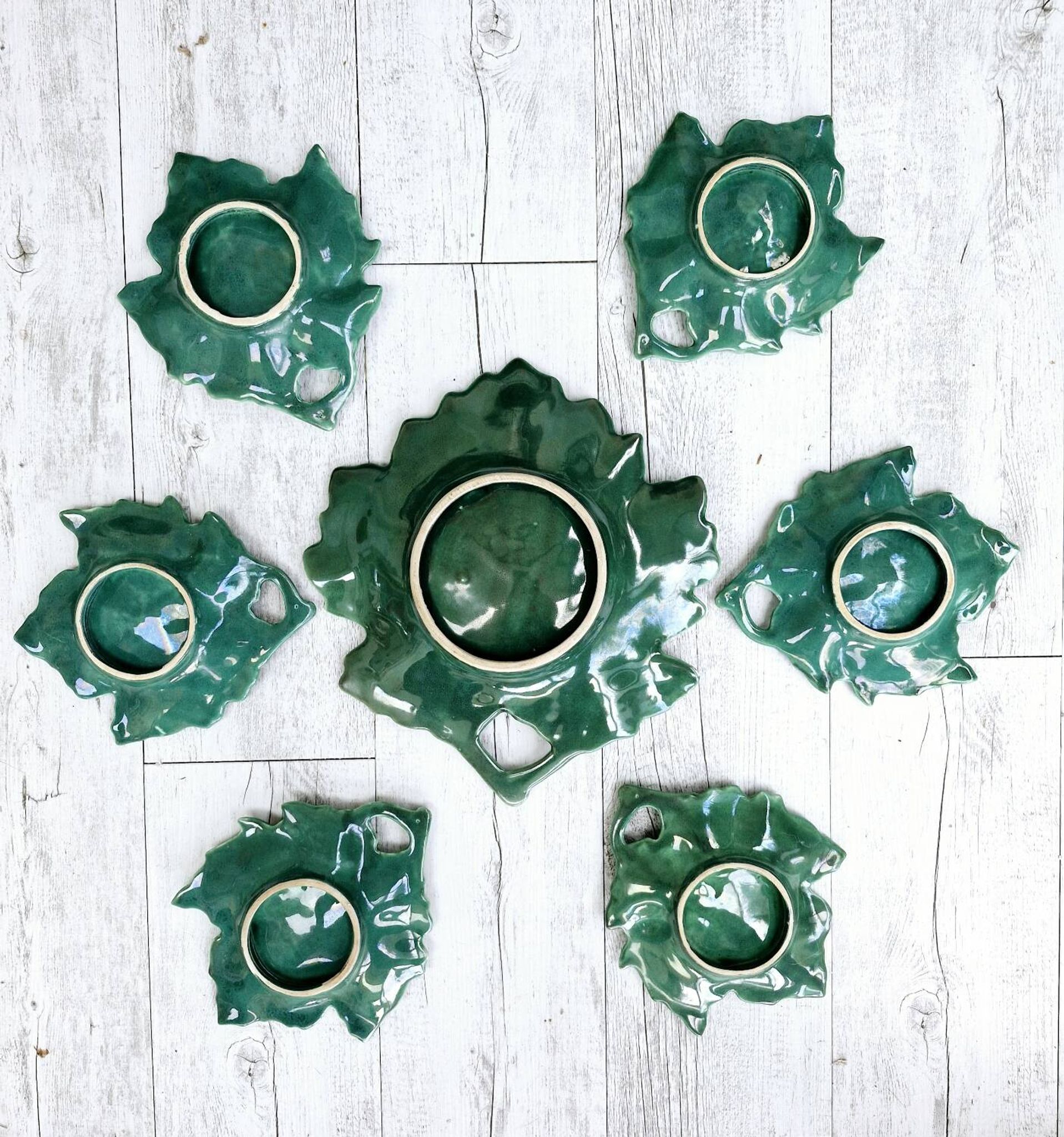 Plate and its 6 vintage bowls from Vallauris, green ceramic in the shape of a leaf.