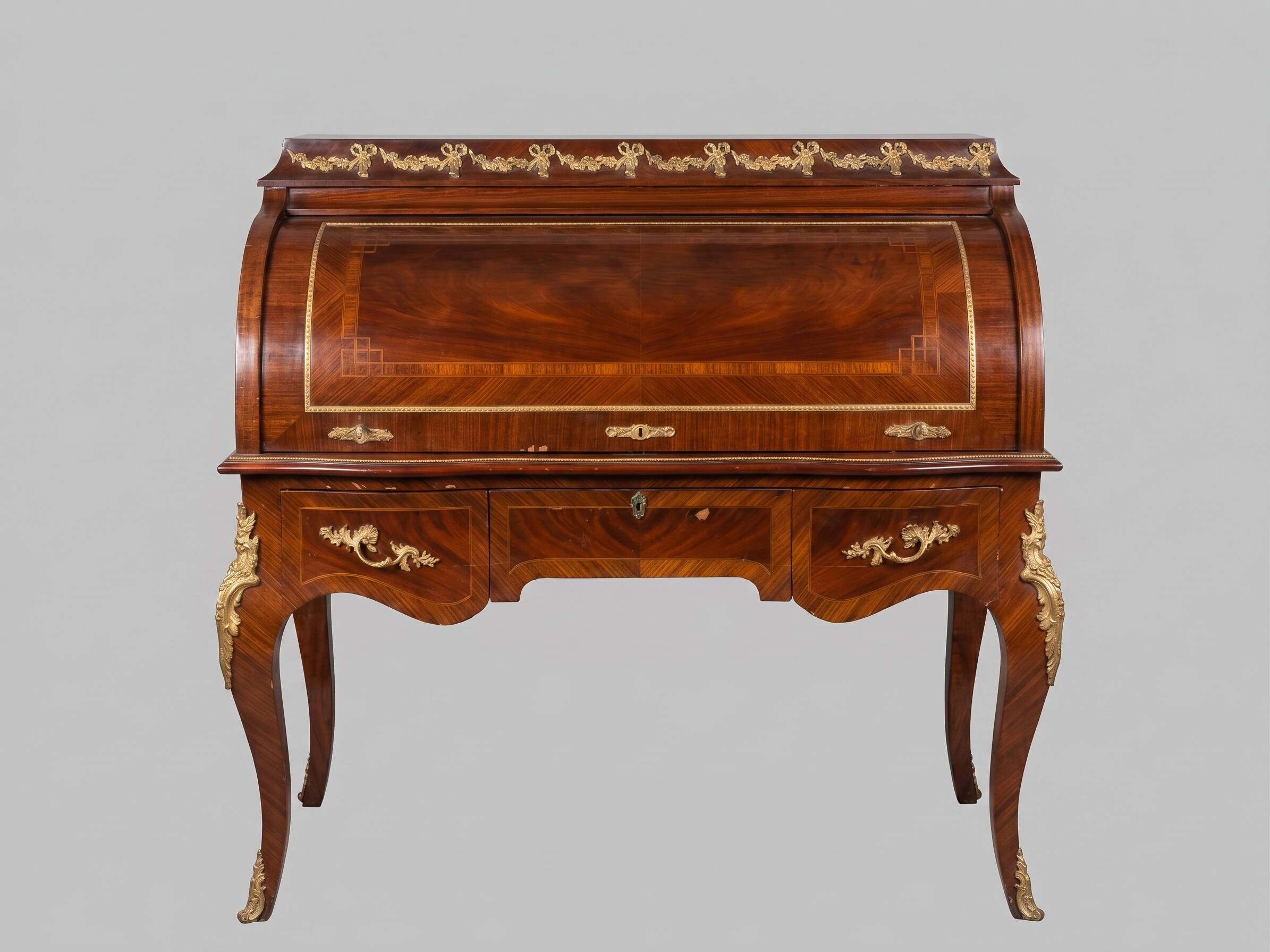 Louis XV cylinder desk with marquetry and bronze.
