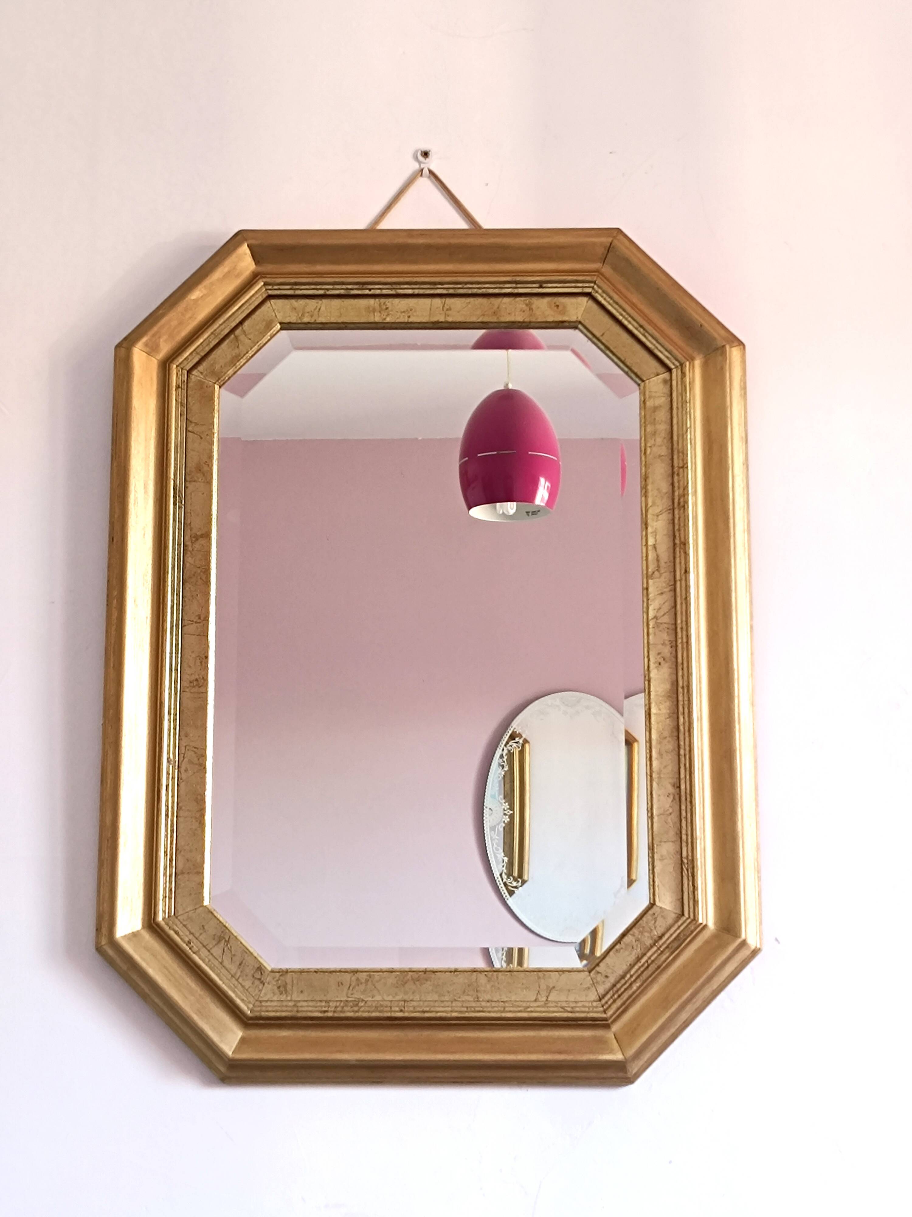 Octagonal gilded wooden mirror