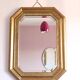 Miroir en bois doré octogonal