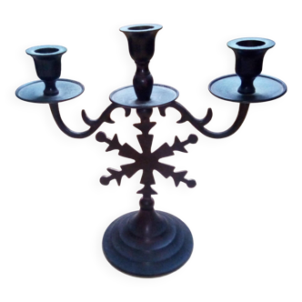 Three-branched black metal candelabra in gothic style