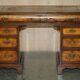 Victorian antique partner's desk in veined walnut with a leather top.