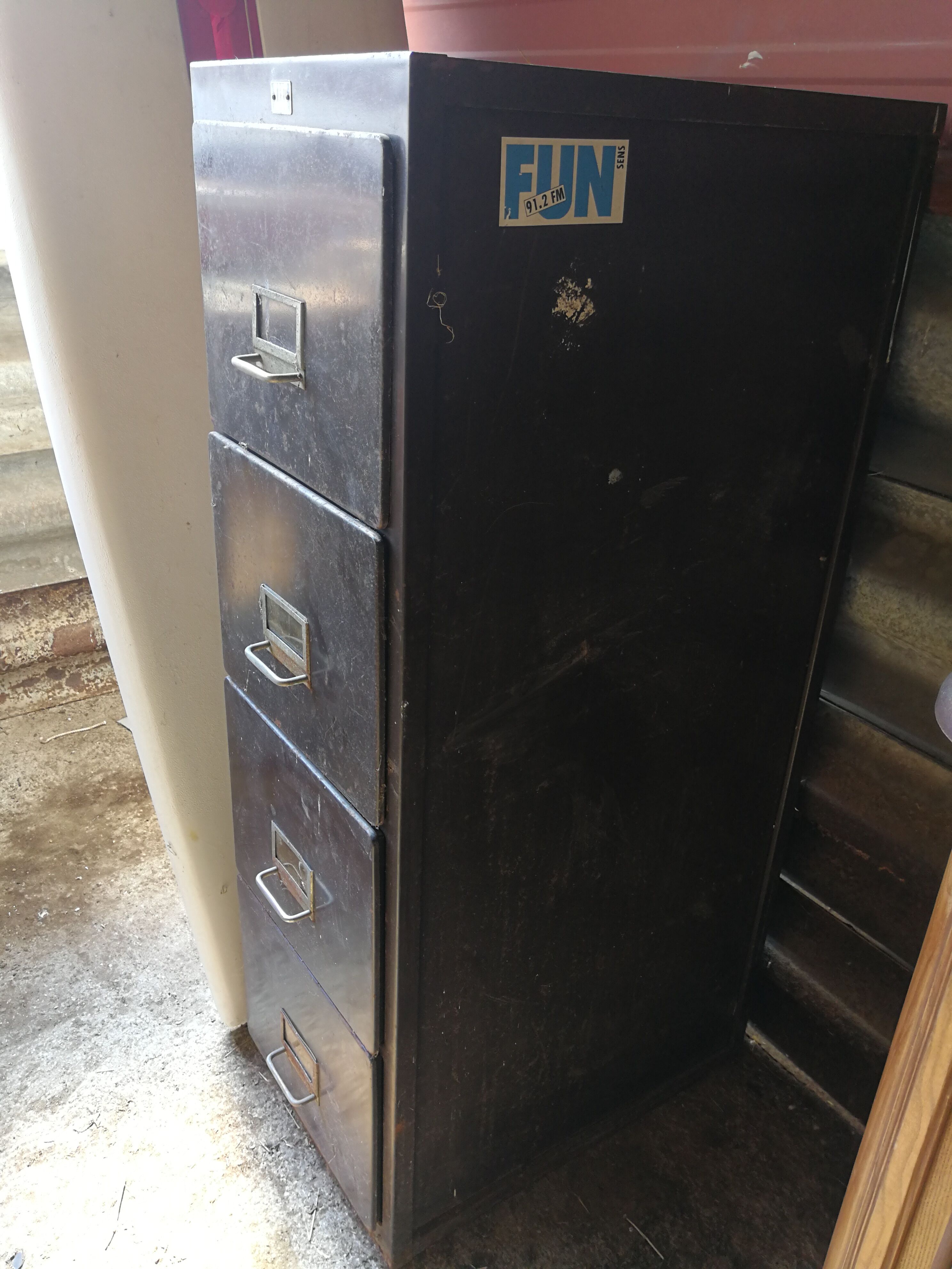 Industrial metal locker with 4 drawers
