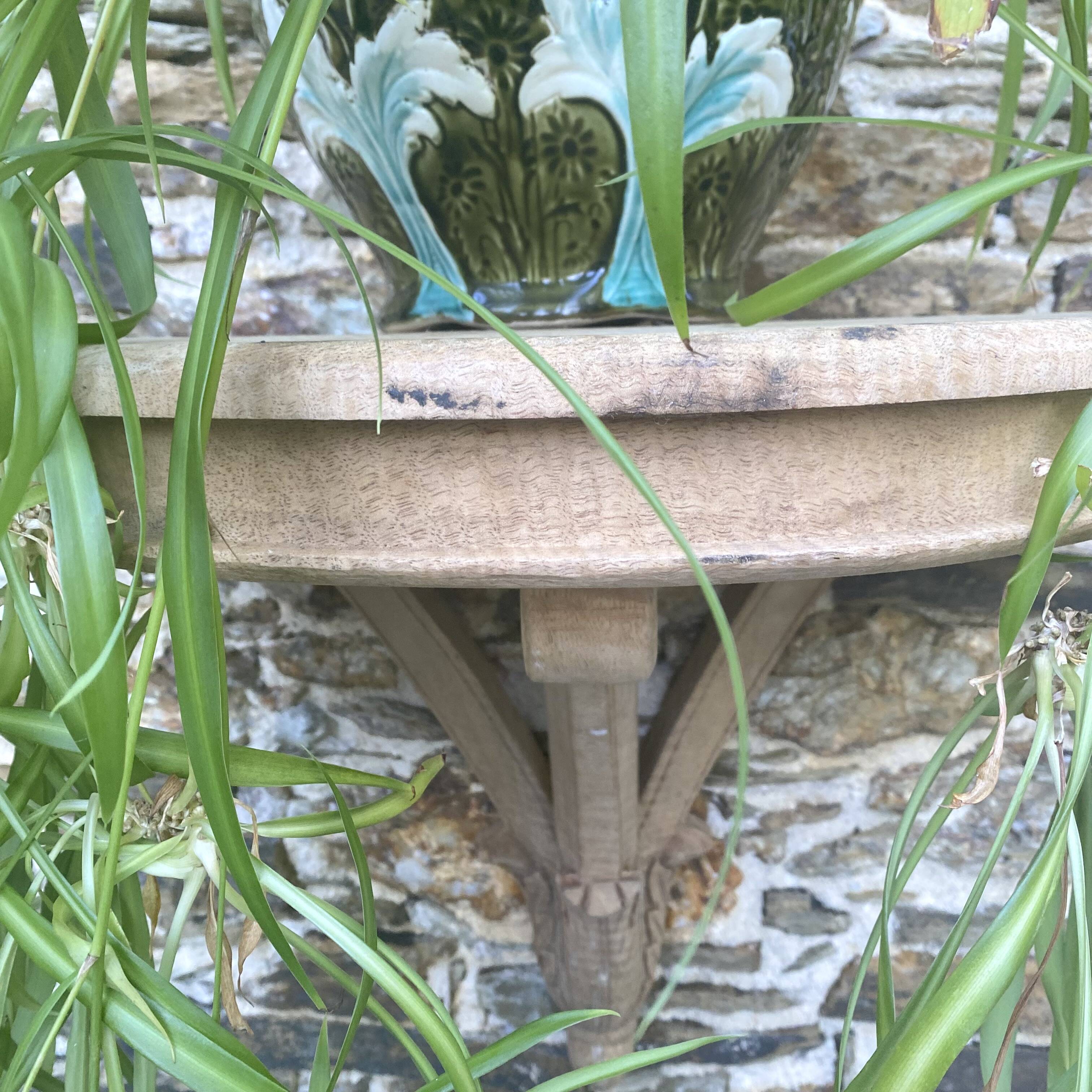 carved wooden wall shelf or wall console