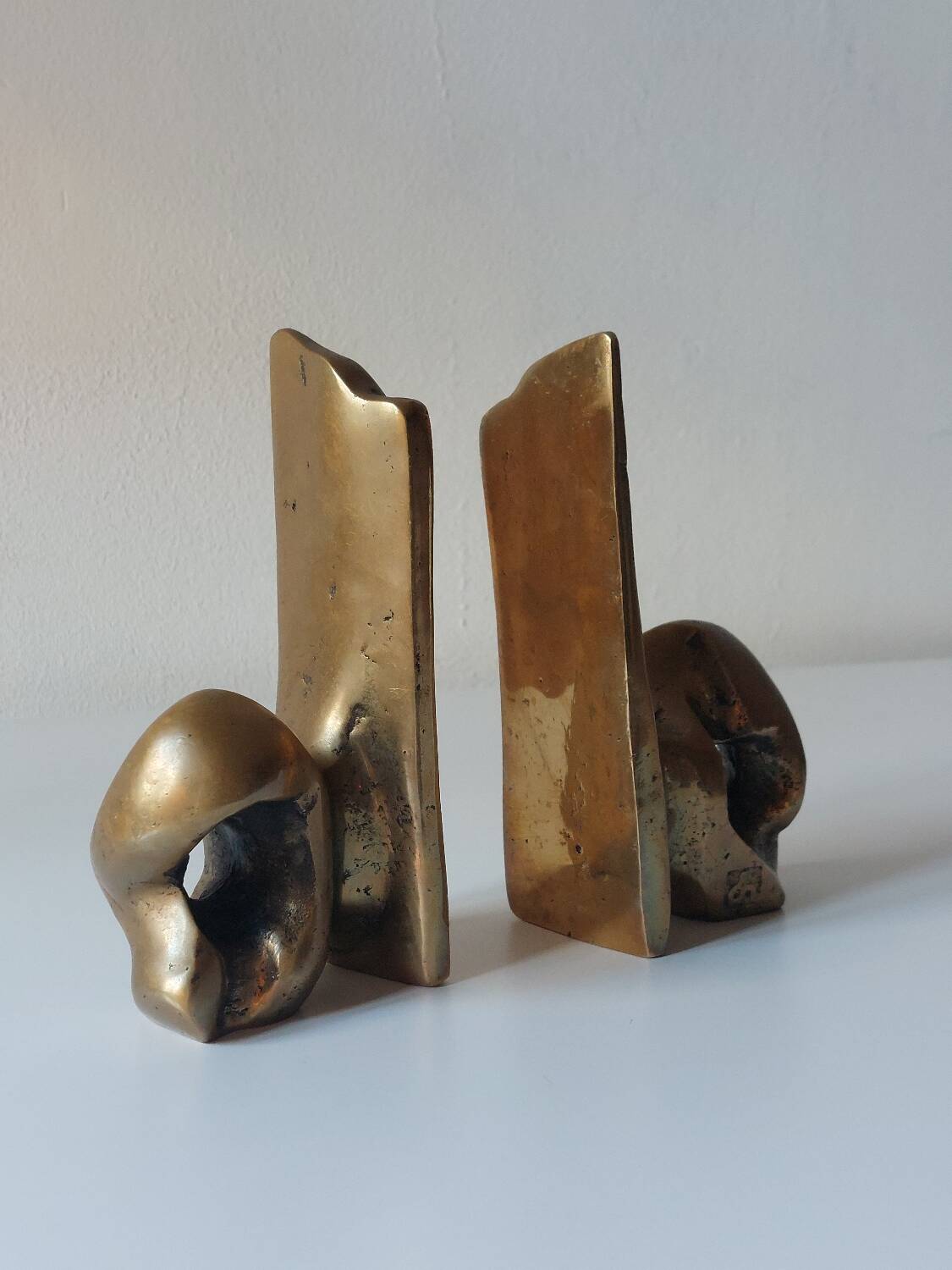 Super rare pair of brutalist brass bookends by David Marshall.