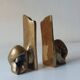 Super rare pair of brutalist brass bookends by David Marshall.