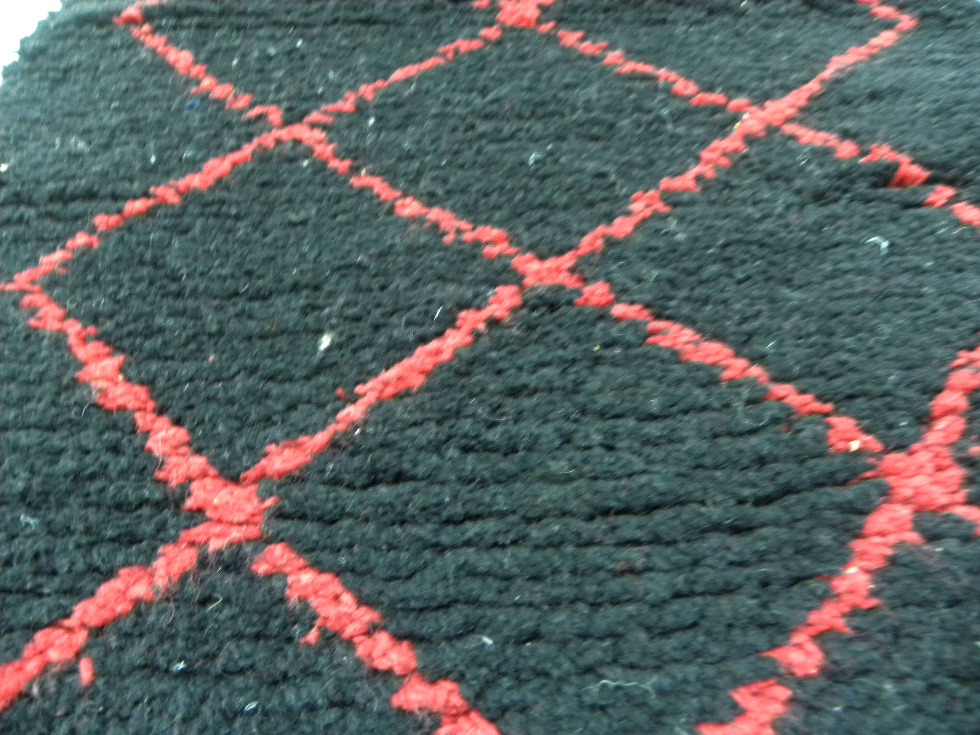 Vintage ancestral black Berber rug in wool