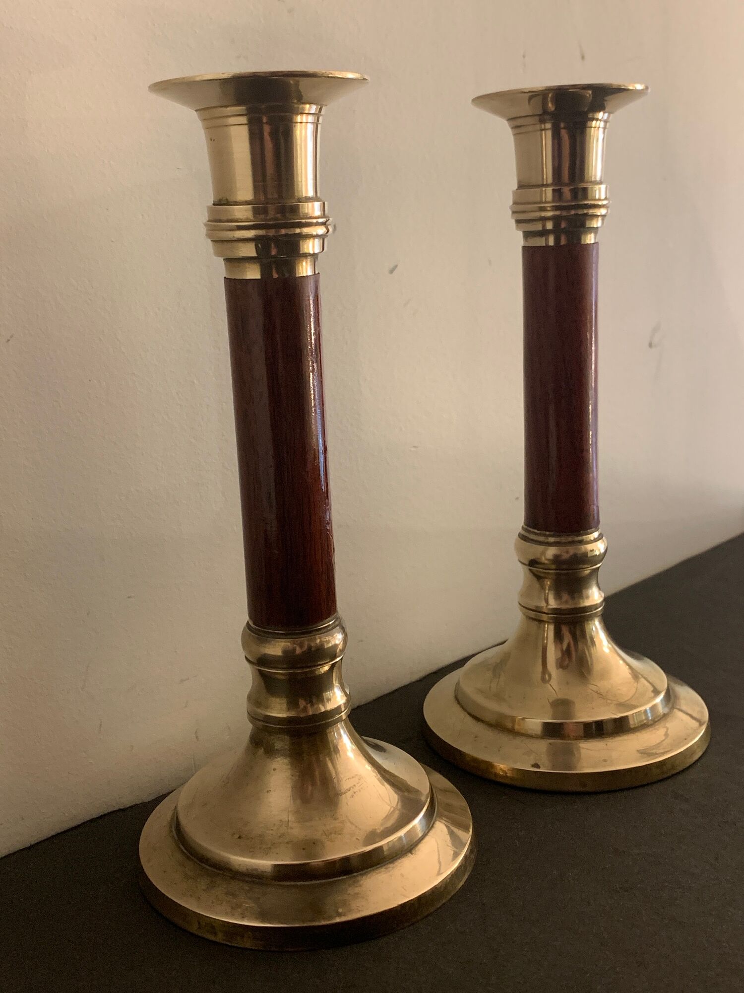 Pair of brass and mahogany wood candle holders