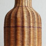 Vase ancien en rotin tressé