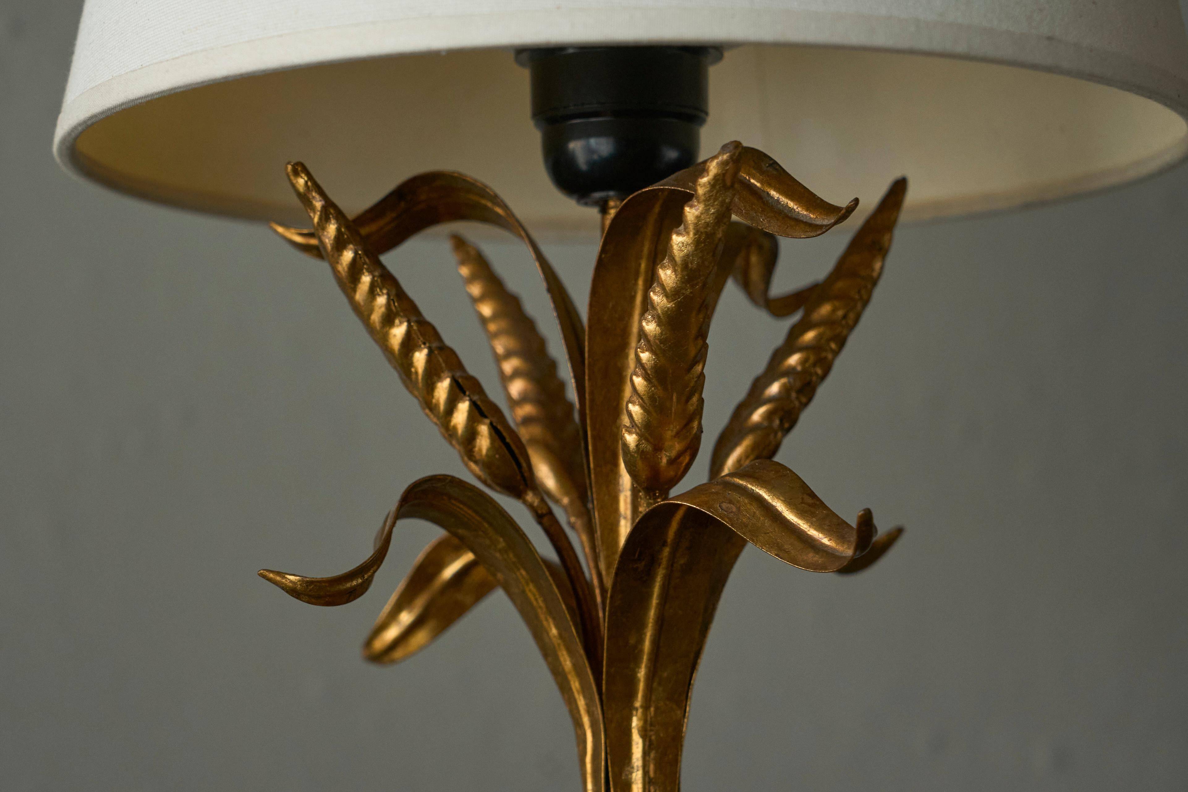 Gold metal table lamp with wheat pattern, mid-20th century.