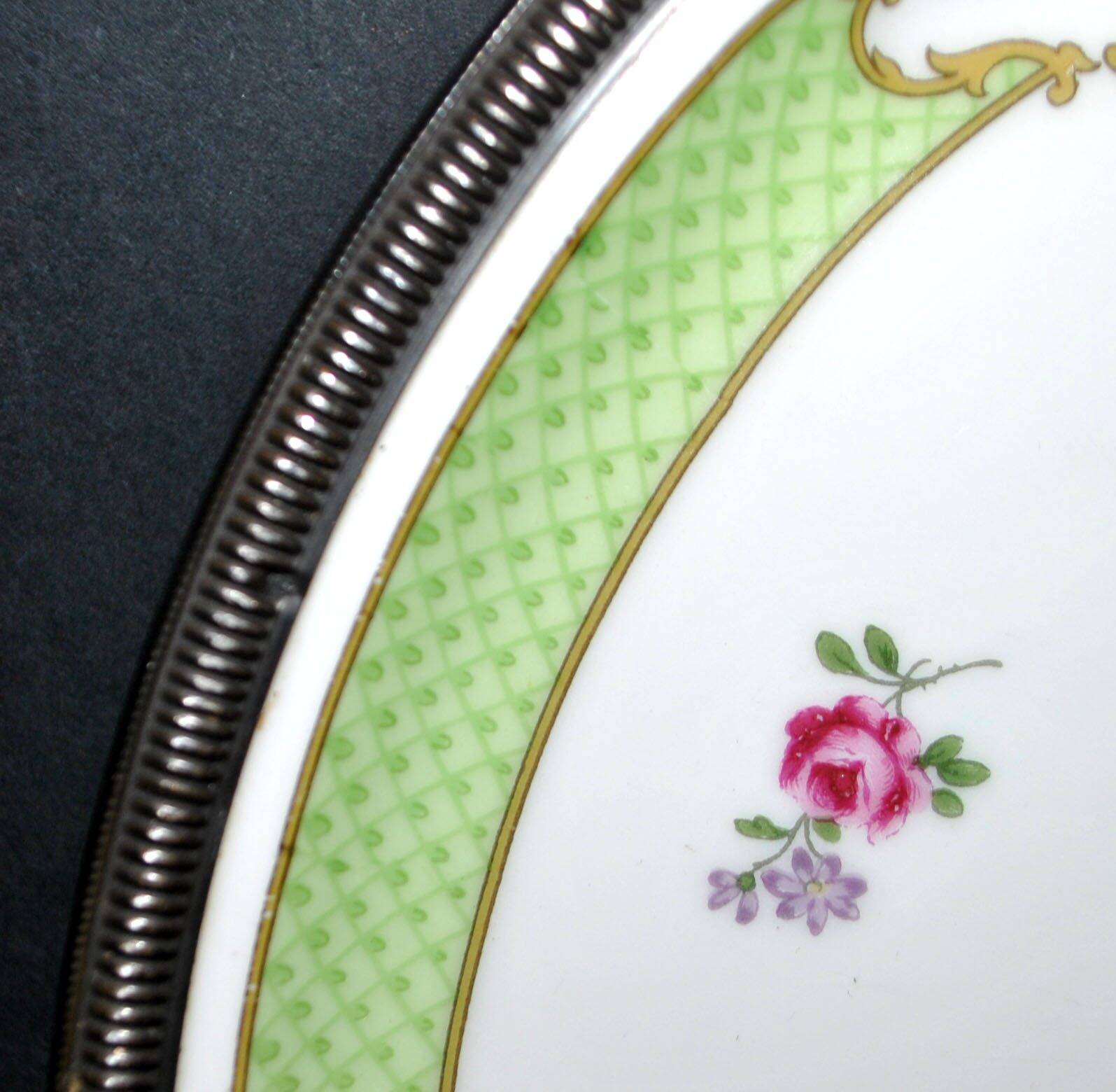 Haviland pie dish in Limoges porcelain with a Minerva silver rim.