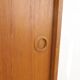 High teak cabinet with sliding doors, 1960s
